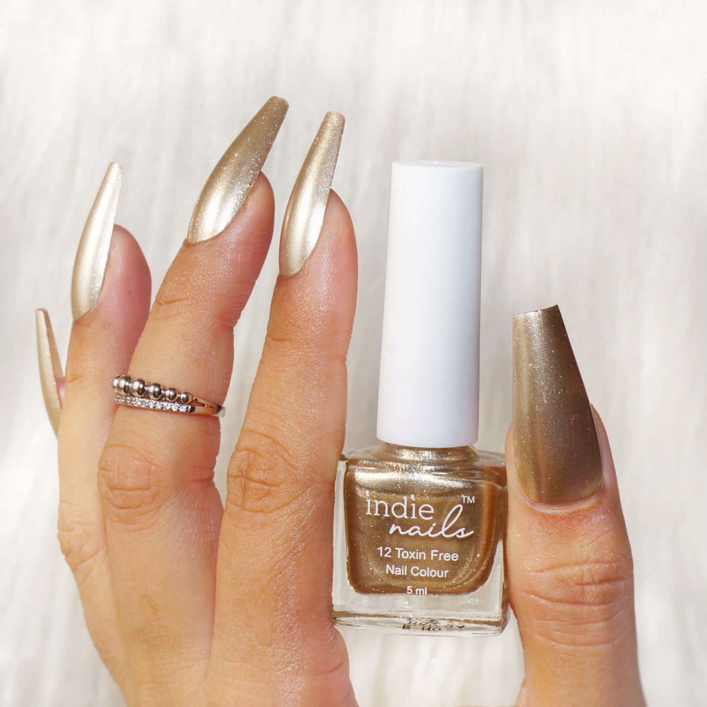 Solar Light – Warm Metallic Tan Polish for Indian Skin Tones