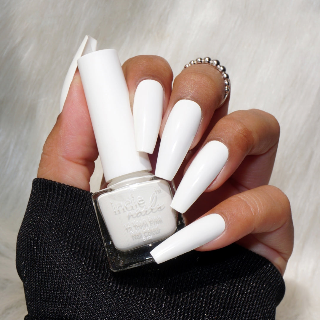 Indie Nails Moonpie white nail polish bottle, Opaque white nail polish swatch on Indian skin, Moonpie nail polish applied on short nails,Glossy white nail color in daylight, White nail paint for French manicure – Indie Nails