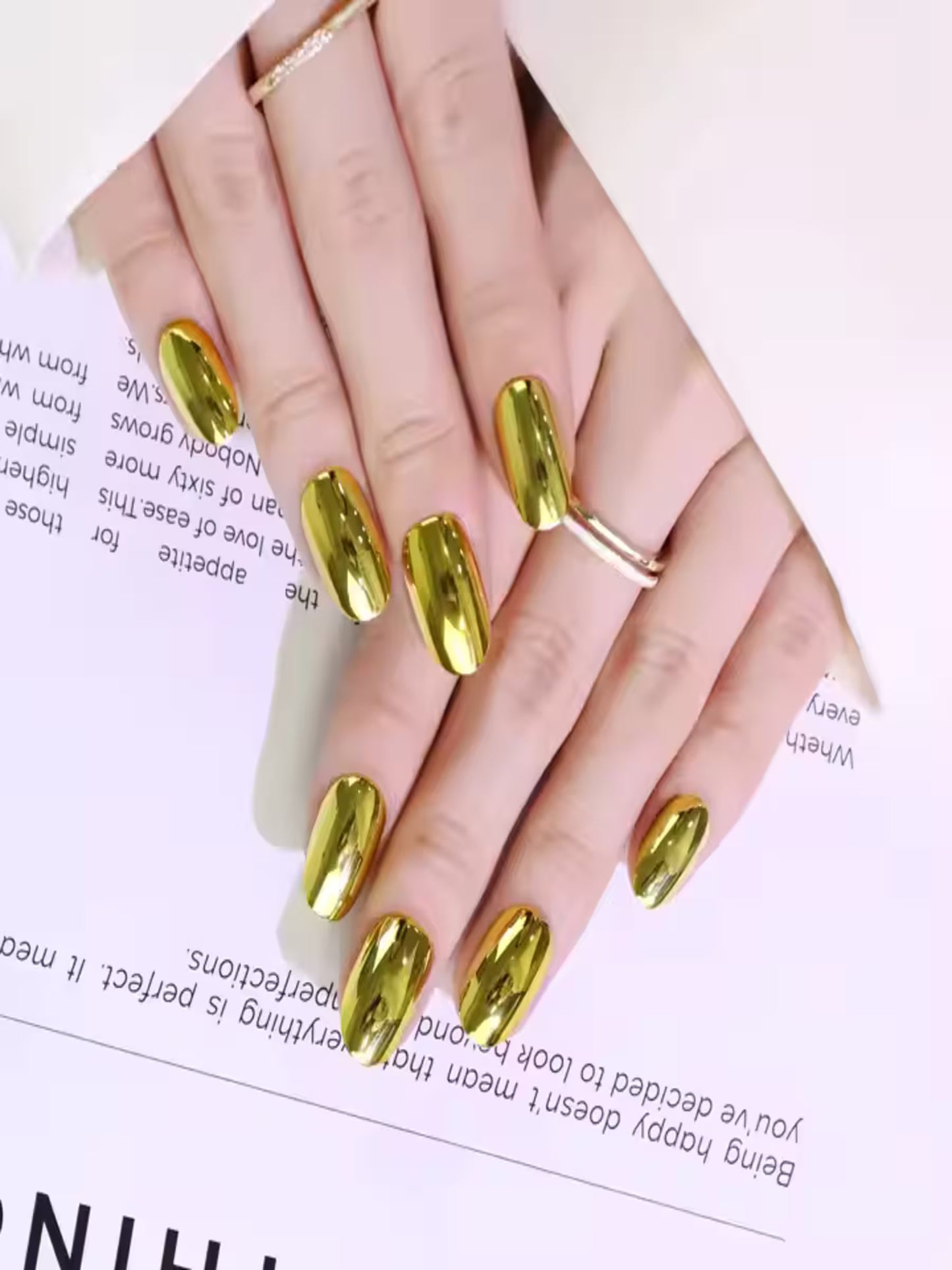 Indie Nails 24 Karat Gold nails on model hand