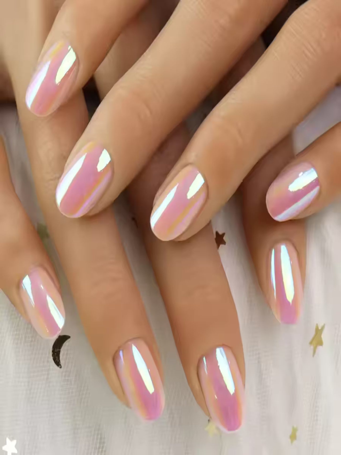 Close-up of model wearing Pink-a-licious nails
